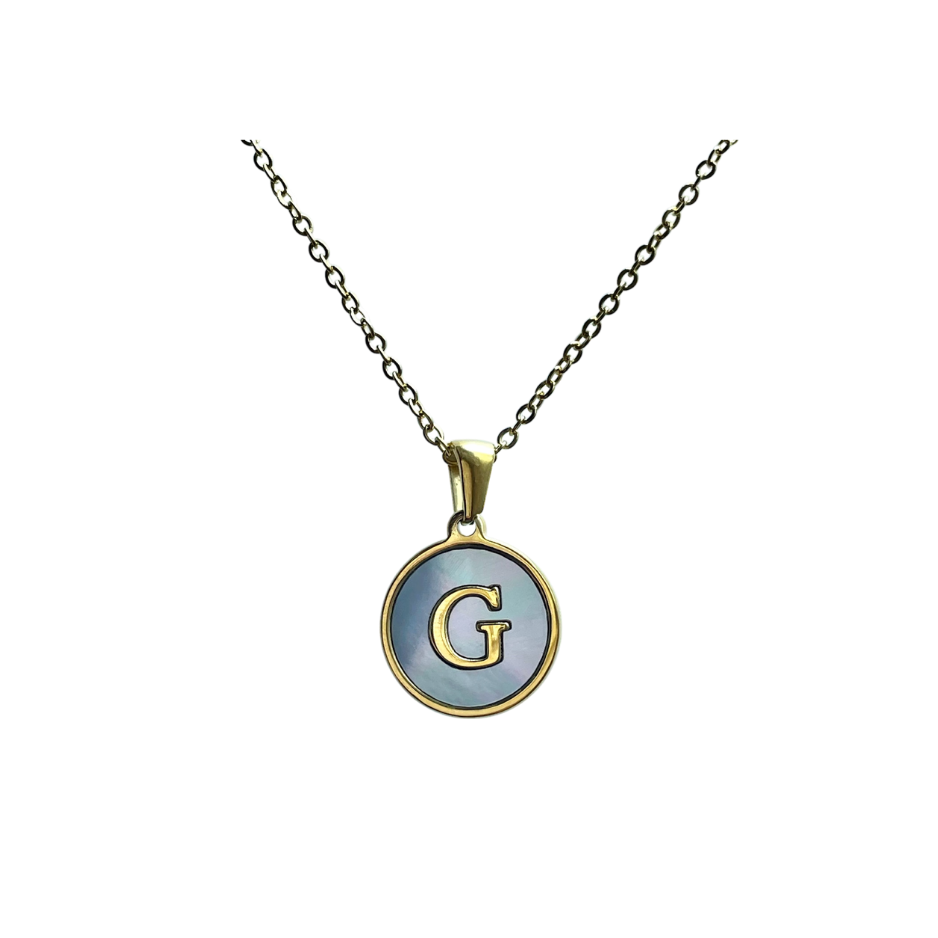 Inicial G fondo mármol circular dorada